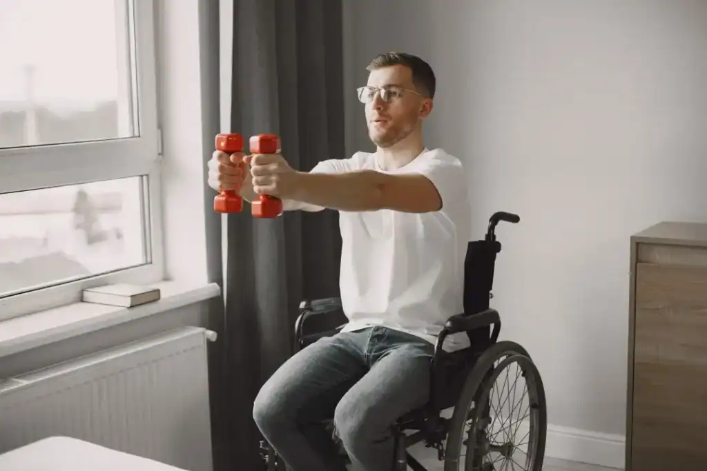 Empowering Weight Loss: A Comprehensive Guide for Individuals with Disabilities 1 Image of man doing exercise in his wheelchair to aid weight loss Wellingborough