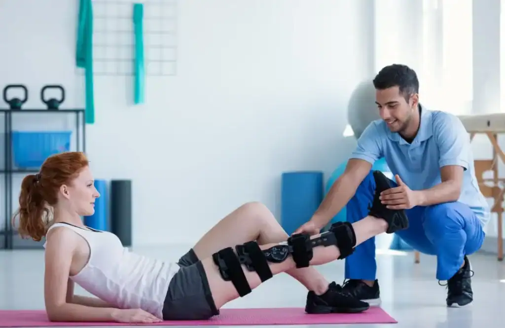 Debunking Meal Timing Myths: The Truth About Muscle Recovery 1 Woman having treatment to help muscle recovery Wellingborough after an injury